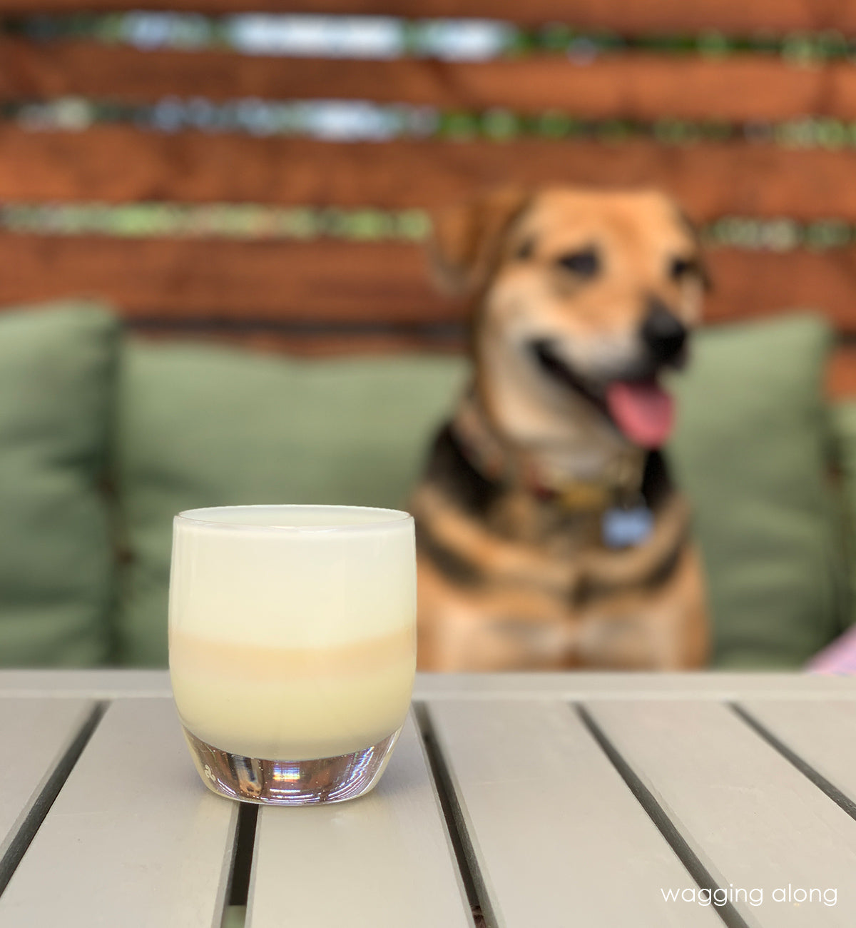 wagging along, pale yellow, hand-blown glass votive candle holder