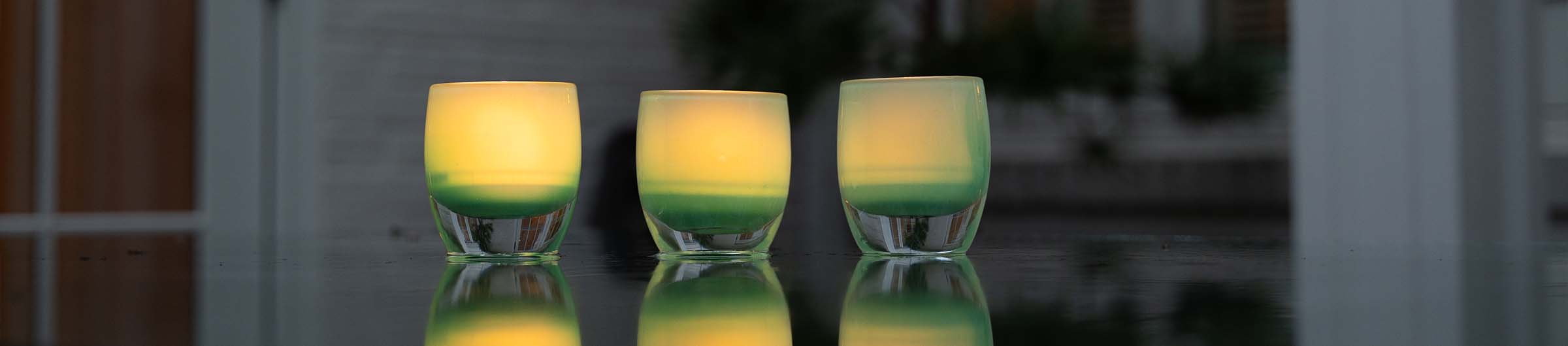 bereavement collection, three strength, opauew green hand-blown glass votive candle holder.