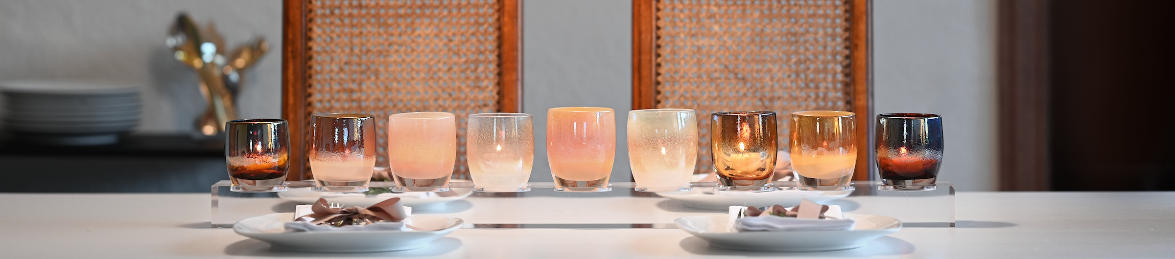 gorgeous glowing golden glassybaby on a table.