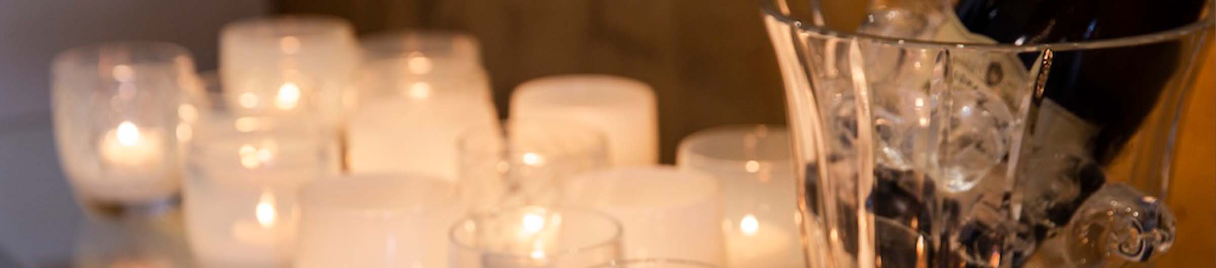 white hand-blown glass votive candle holders