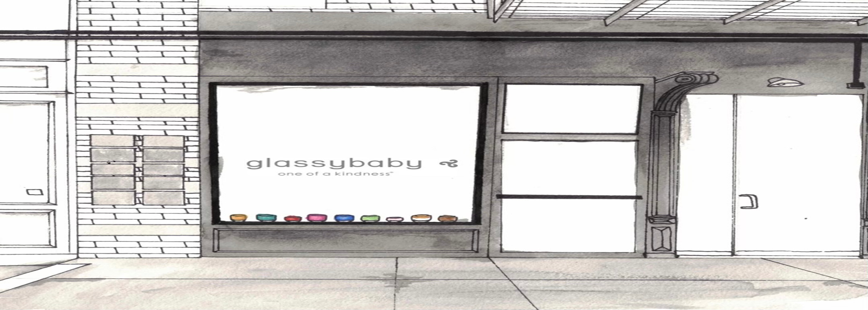 video of hands drawing and painting a street view store landscape