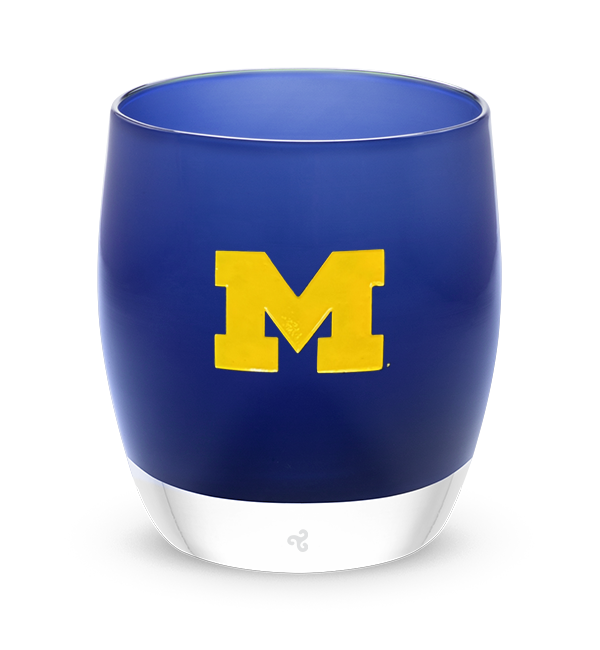 Michigan, navy blue with sandblasted University of Michigan etching hand painted in yellow, hand-blown glass votive candle holder.