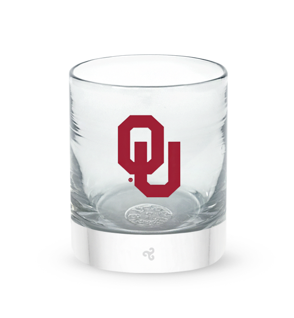 University of Oklahoma rocker, clear hand-blown lowball drinking glass with University of Oklahoma hand-etched in red.