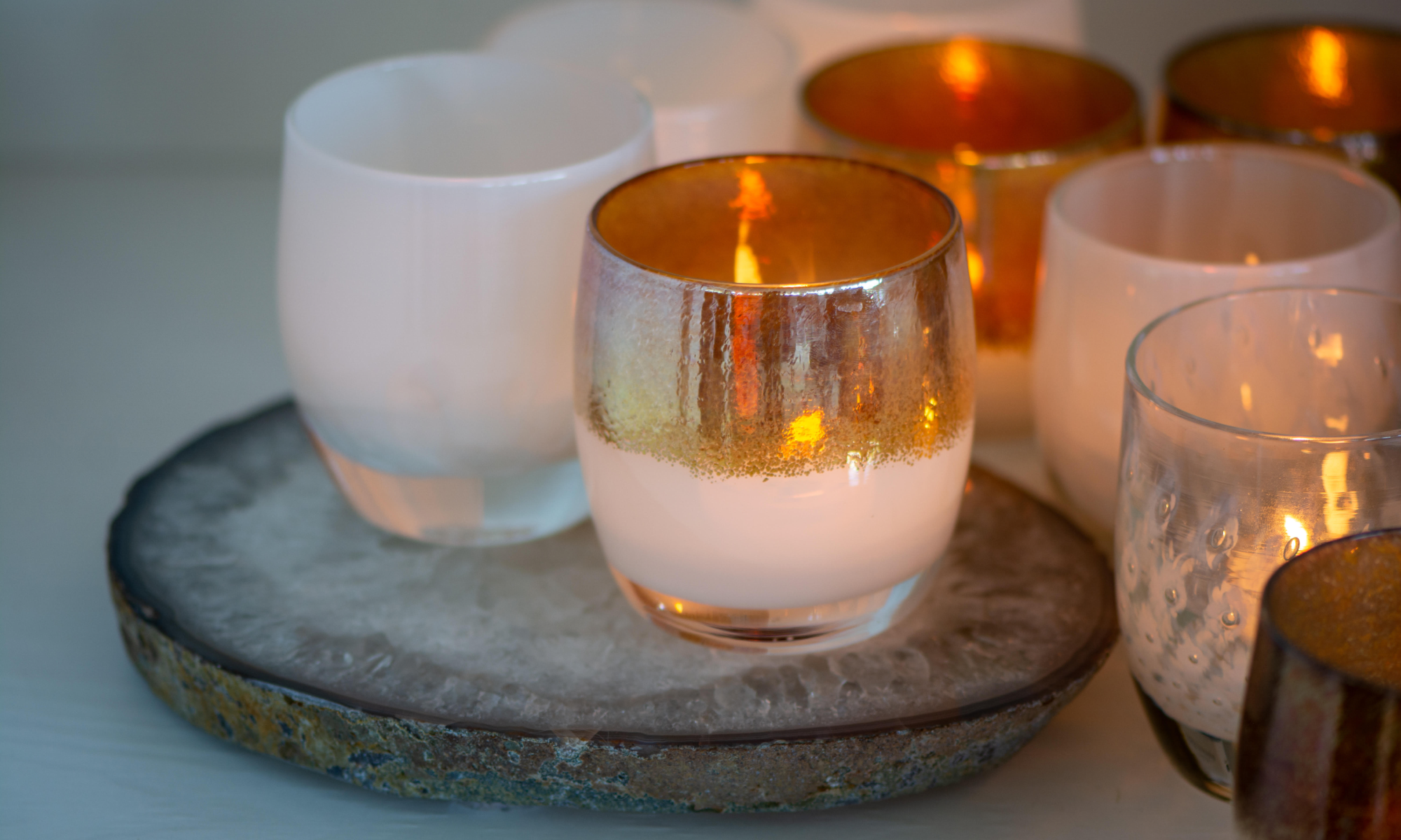 hand-blown glass votive candle holders & drinkware