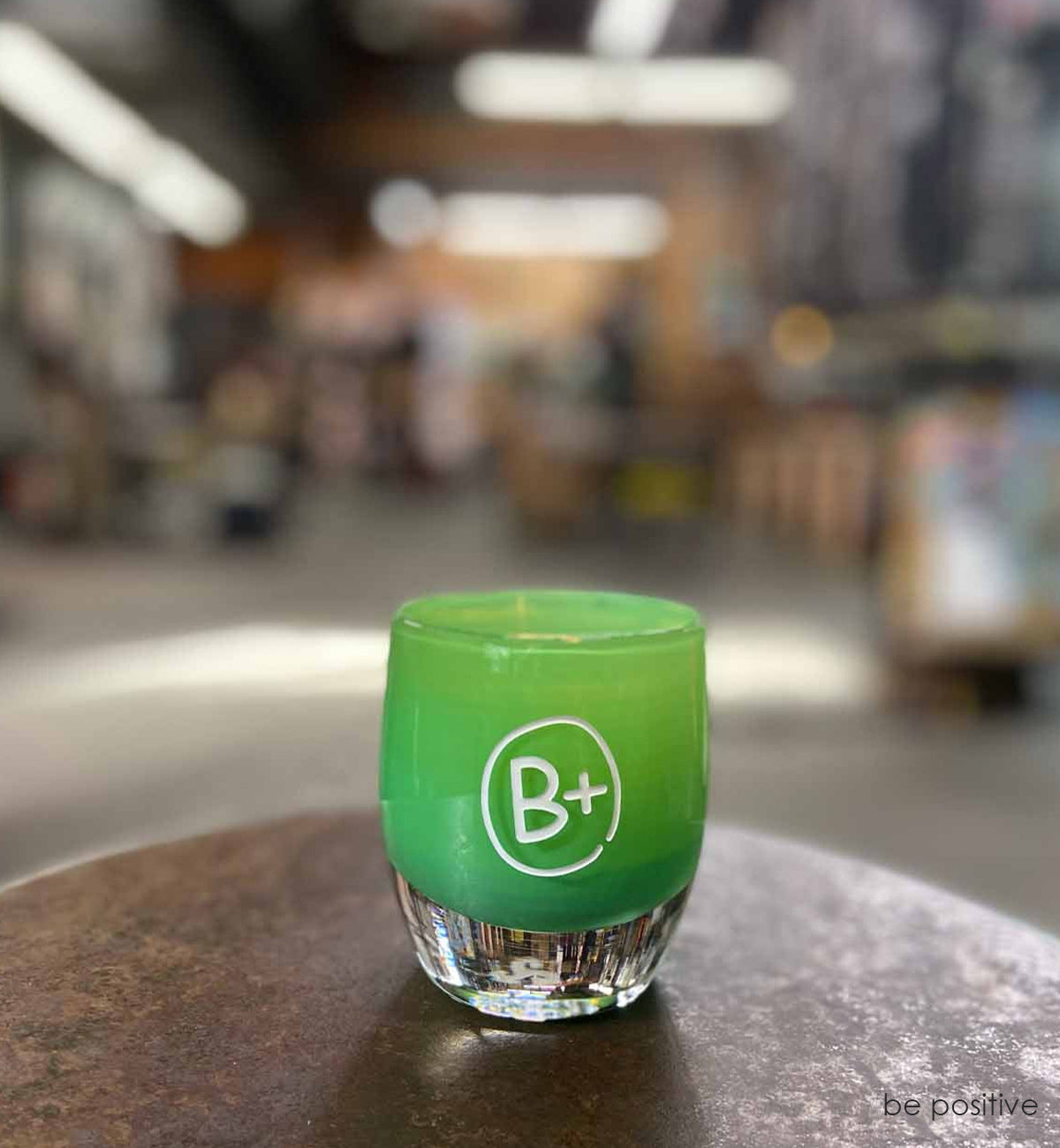 be positive on a stool in the hot shop, hand-blown glass votive candle holder.