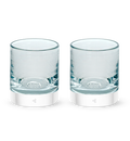 two Clarity rockers, clear with light blue hues hand-blown glass lowball drinking glasses.