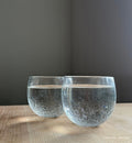 two crackle drinkers, clear crackle textured hand-blown drinking glass
