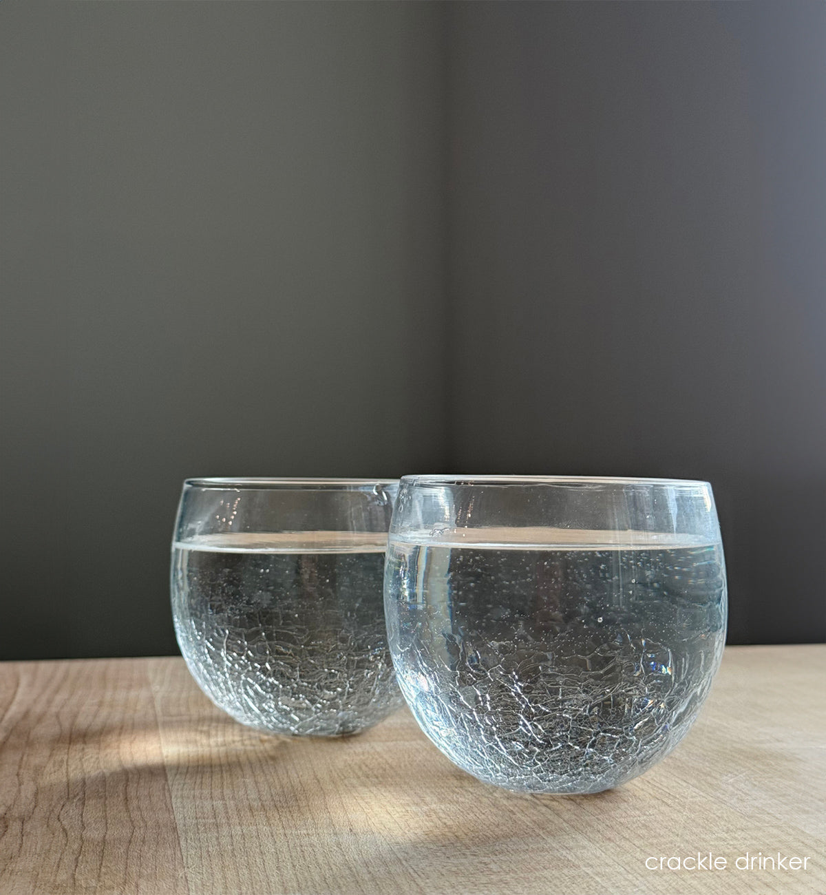 two crackle drinkers, clear crackle textured hand-blown drinking glass