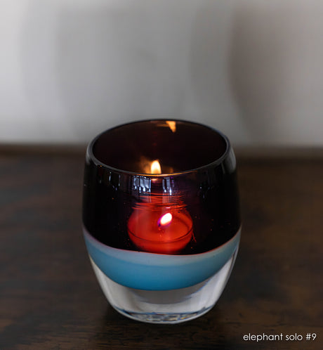 elephant solo # purple and turquoise hand-blown glass candle holder. 