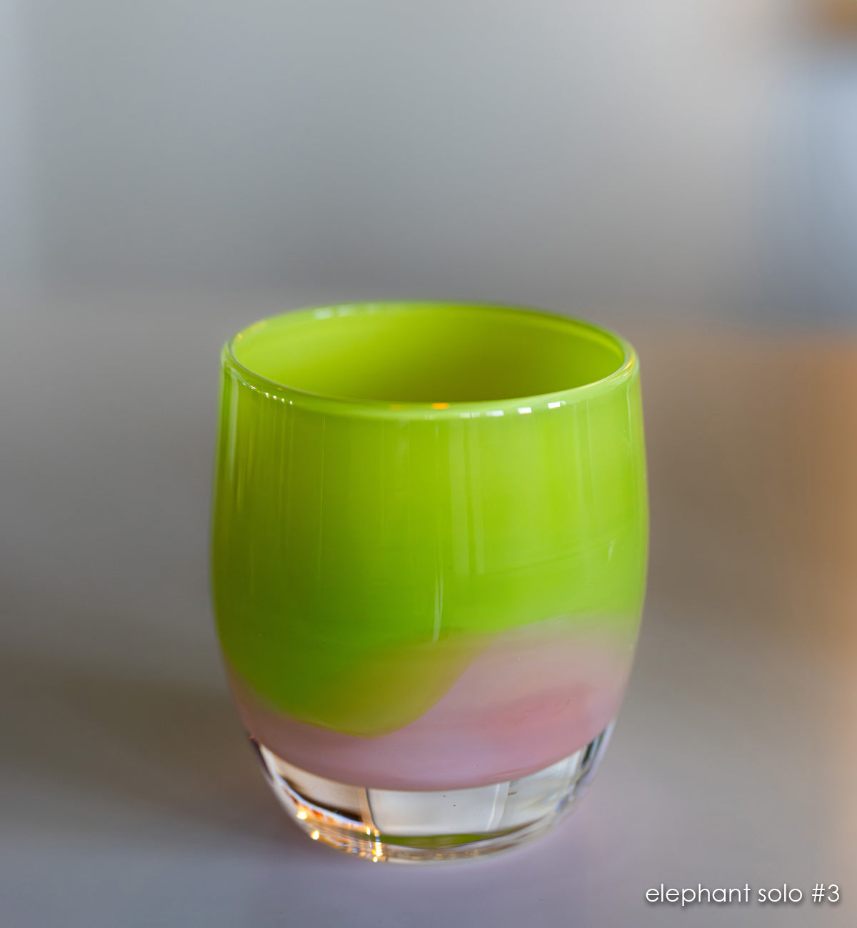 elephant solo #3 green/pink hand-blown glass candle holder. 