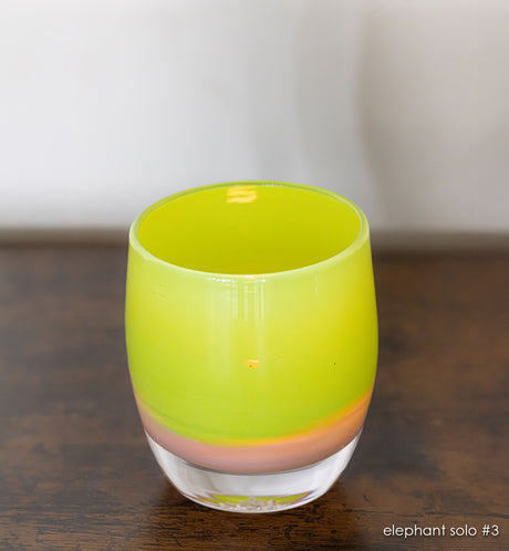 elephant solo #3 green/pink hand-blown glass candle holder. 