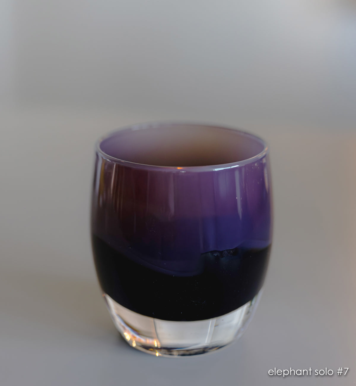 elephant solo #7 purple and brown hand-blown glass candle holder. 