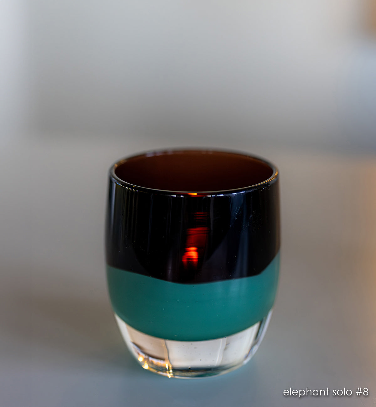 elephant solo #8 purple and green hand-blown glass candle holder. 