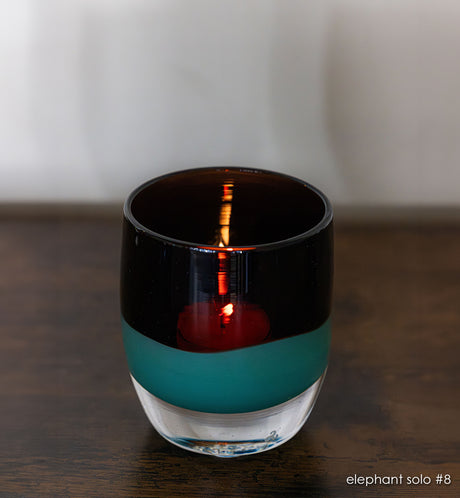 elephant solo #8 purple and green hand-blown glass candle holder. 