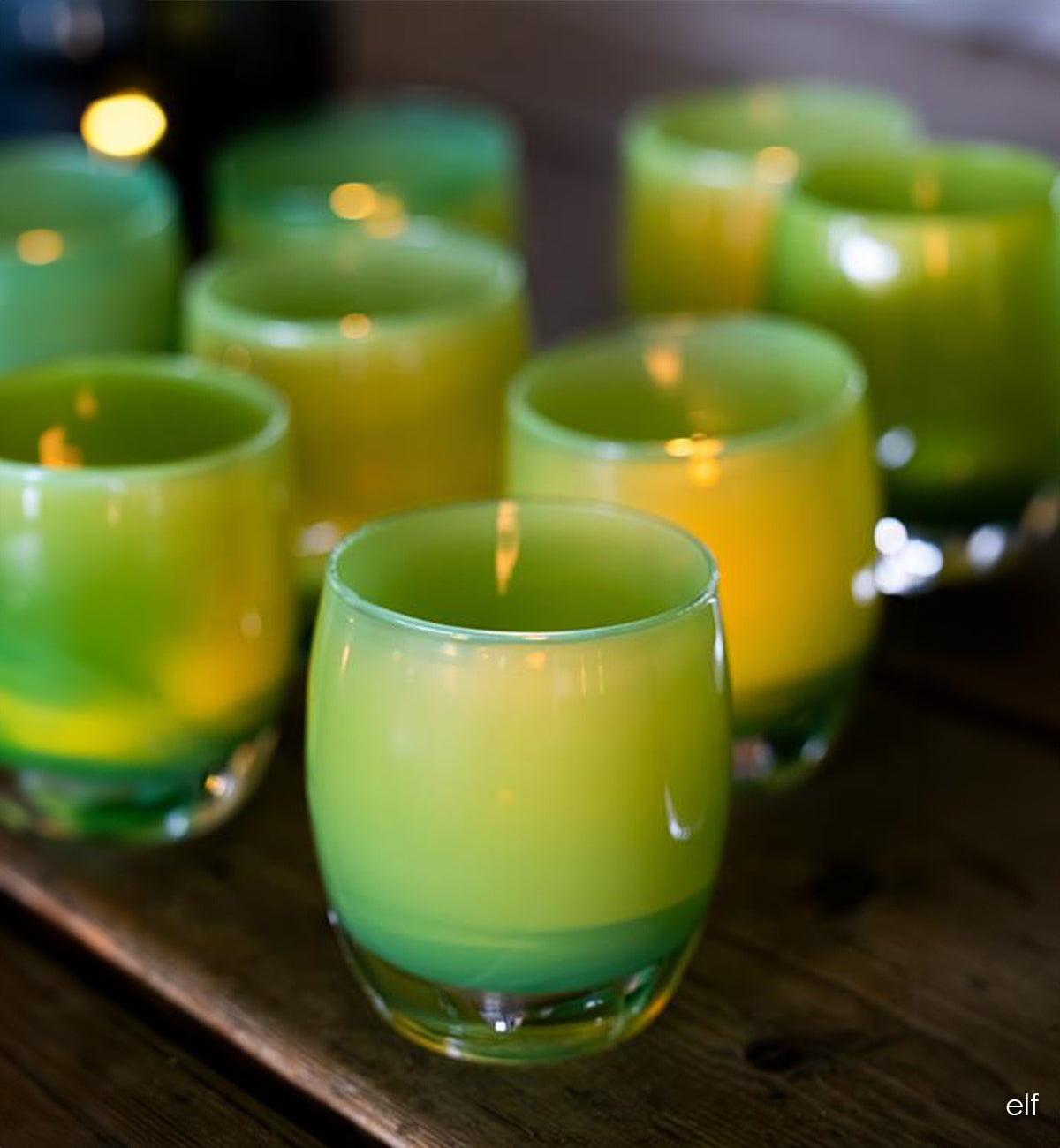 elf opaque light green hand-blown glass votive candle holder.