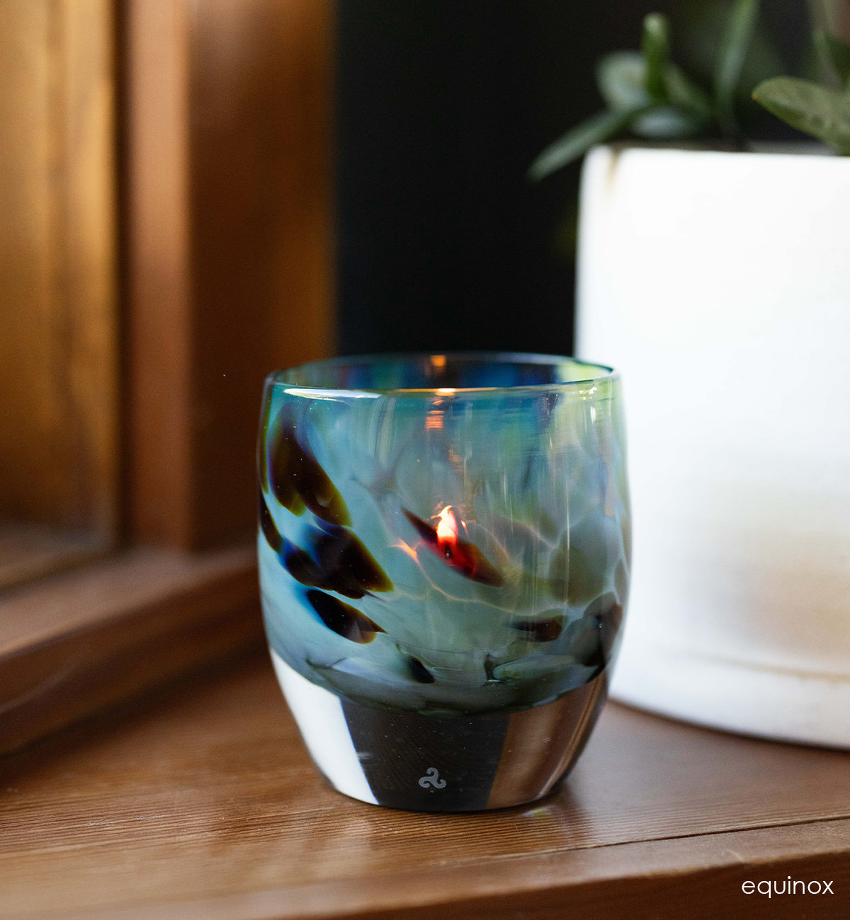 equinox light blue and brown hand-crafted glass votive candle holder.