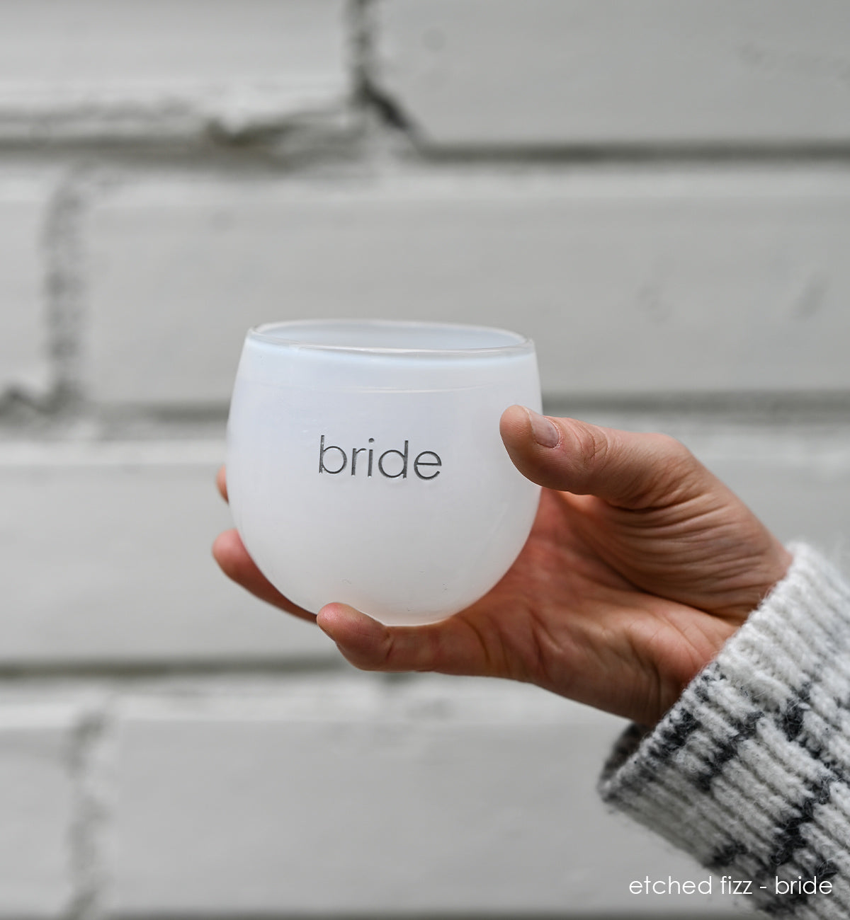 fizz white, hand-blown drinking glass, etched with the word bride.