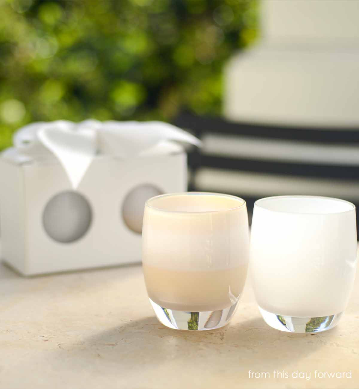 from this day forward set, true white off white, cherish white, hand-blown glass votive candle holders in front of a gift box and greenery.