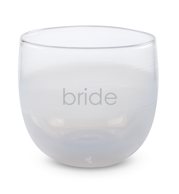 white hand-blown drinking glass etched with the word bride.
