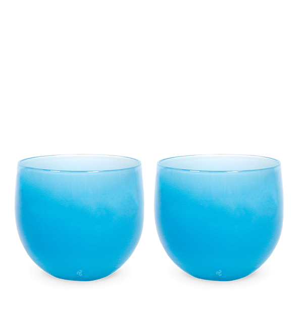 mezcal set two bright blue hand-blown drinking glasses.