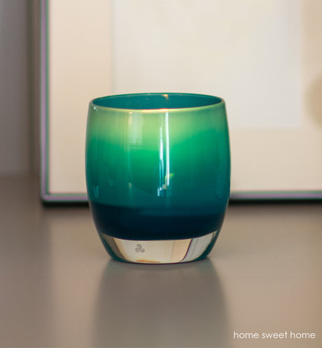 three home sweet home deep blue, hand-blown glass votive candle holders on a white mantle 