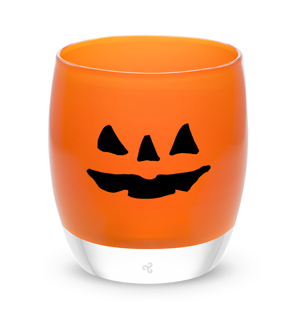 jack-o-lantern, orange hand-blown glass votive candle holder with a spooky jack-o-lantern face hand-etched in black fill.