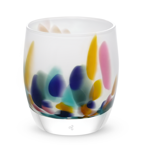 mahalo, white with multi-colored yellow, pink, teal, purple and green petals hand-blown glass votive candle holder.