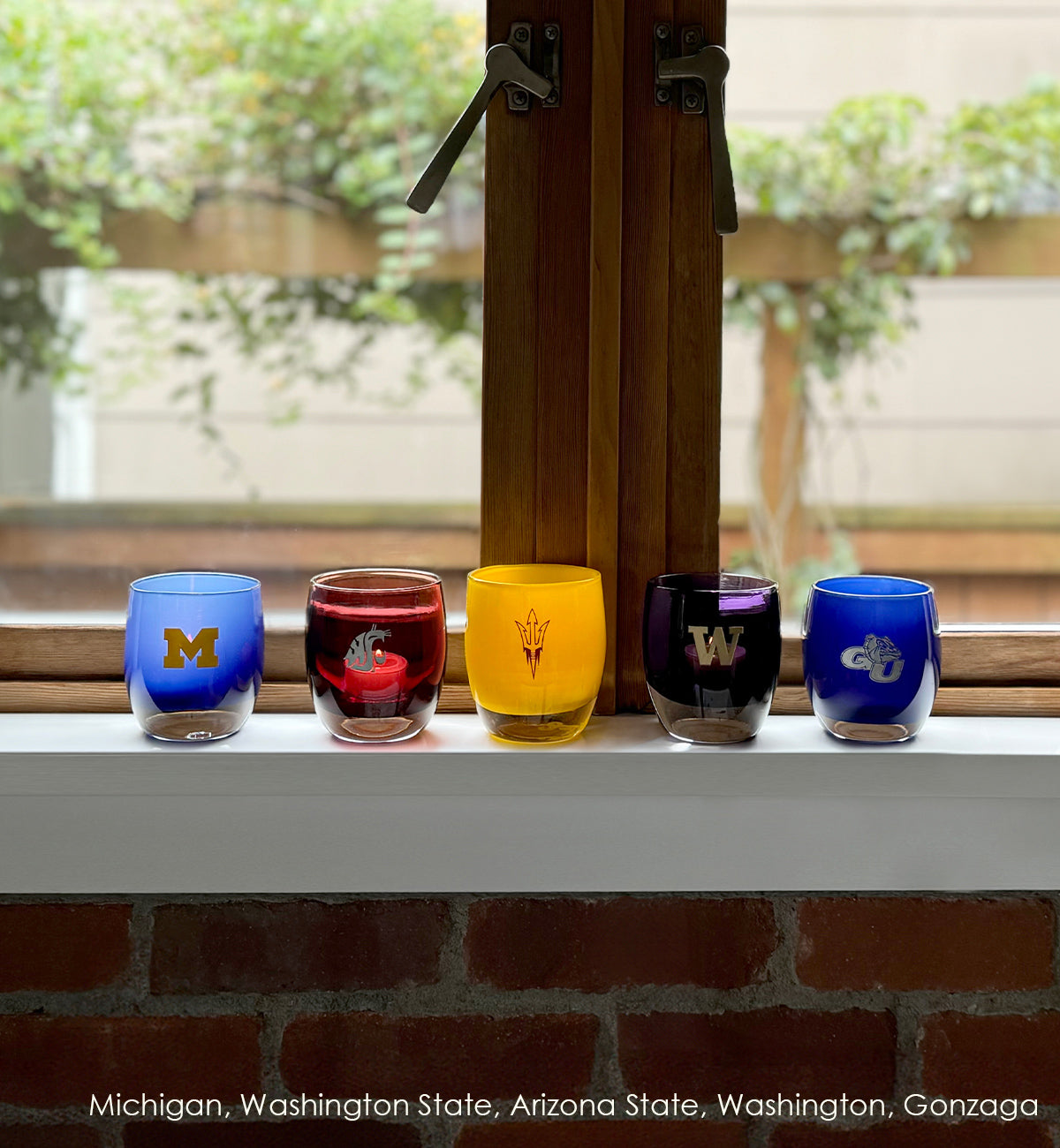 collegiate glassybaby, hand-blown glass votives with etched Michigan, Washington State, Arizona State, Washington and Gonzaga logos,