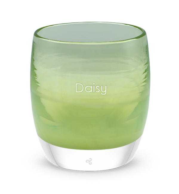 off the leash is a moss green hand-blown glass votive candle holder. transparent towards the top, etched with "daisy"
