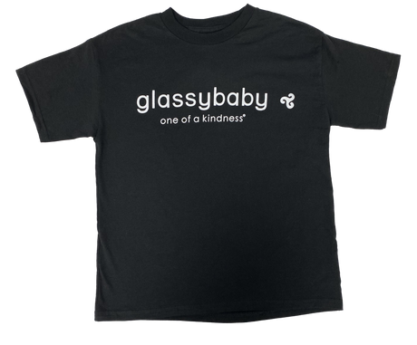 glassybaby one of a kindness in white font on a black t-shirt.