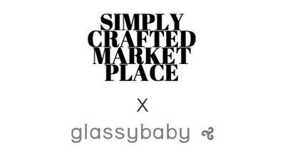 Collaboration logo between Simply Crafted Market Place and glassybaby on a white background