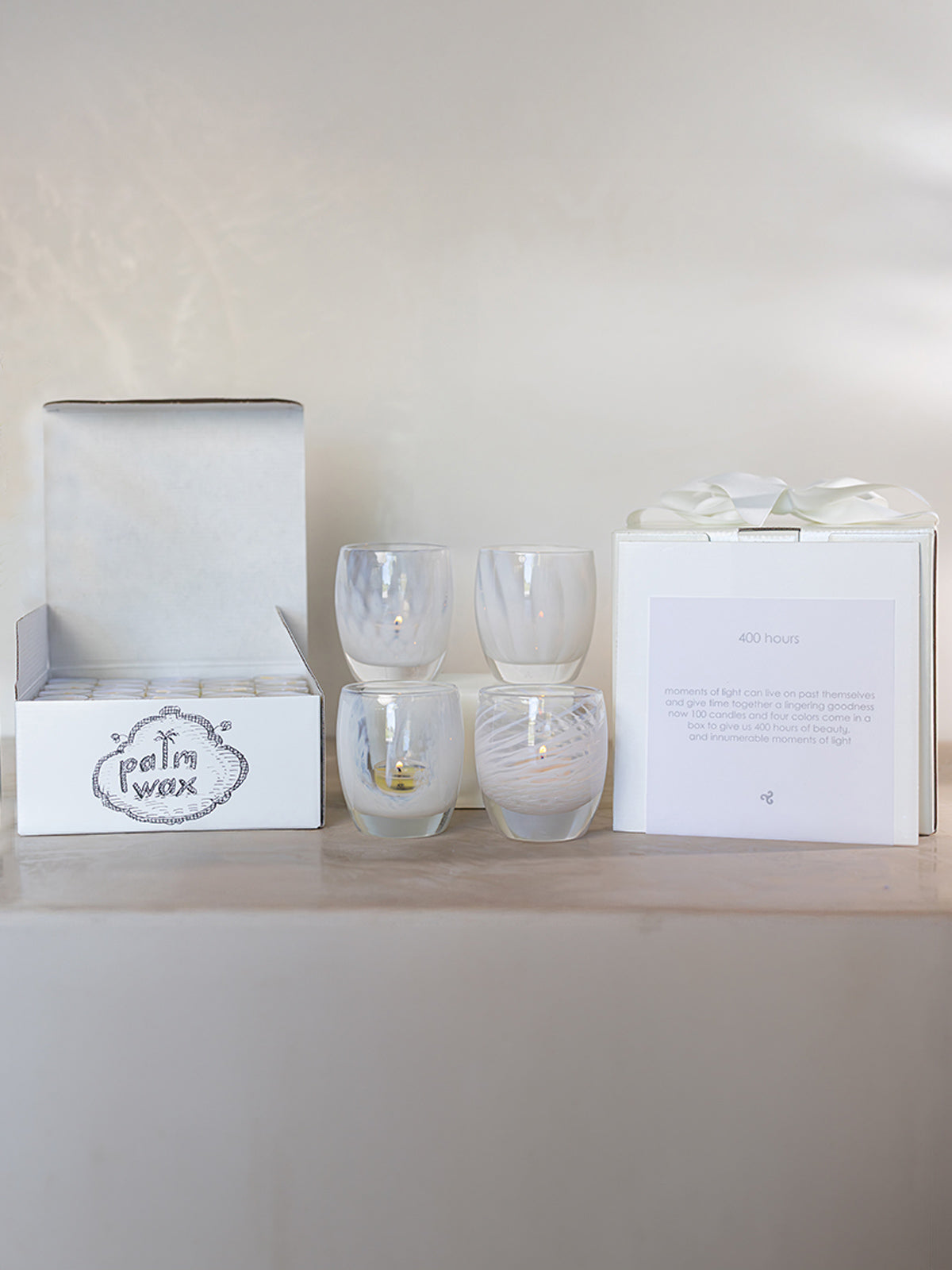"this day forward" wedding set has four different patterns of gentle white, also includes box of 100 tea light candles