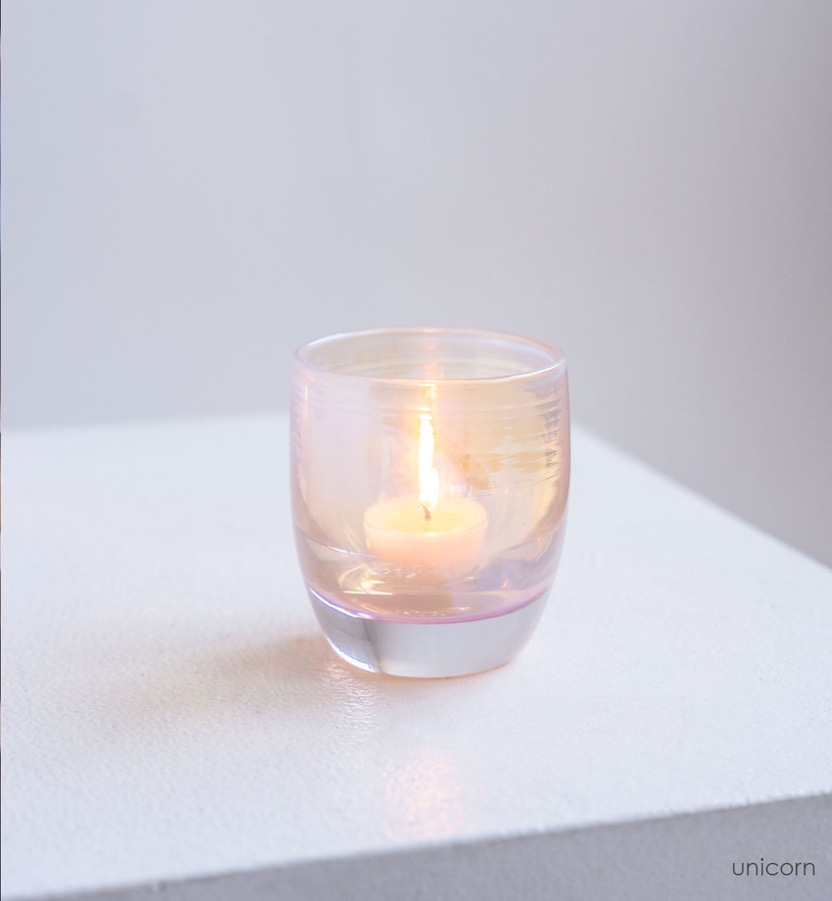 unicorn, iridescent pink hand-blown glass votive candle holder.