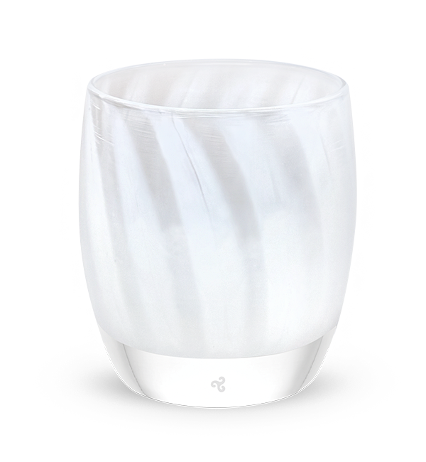 Clear glass tumbler with white marbled pattern on a white background