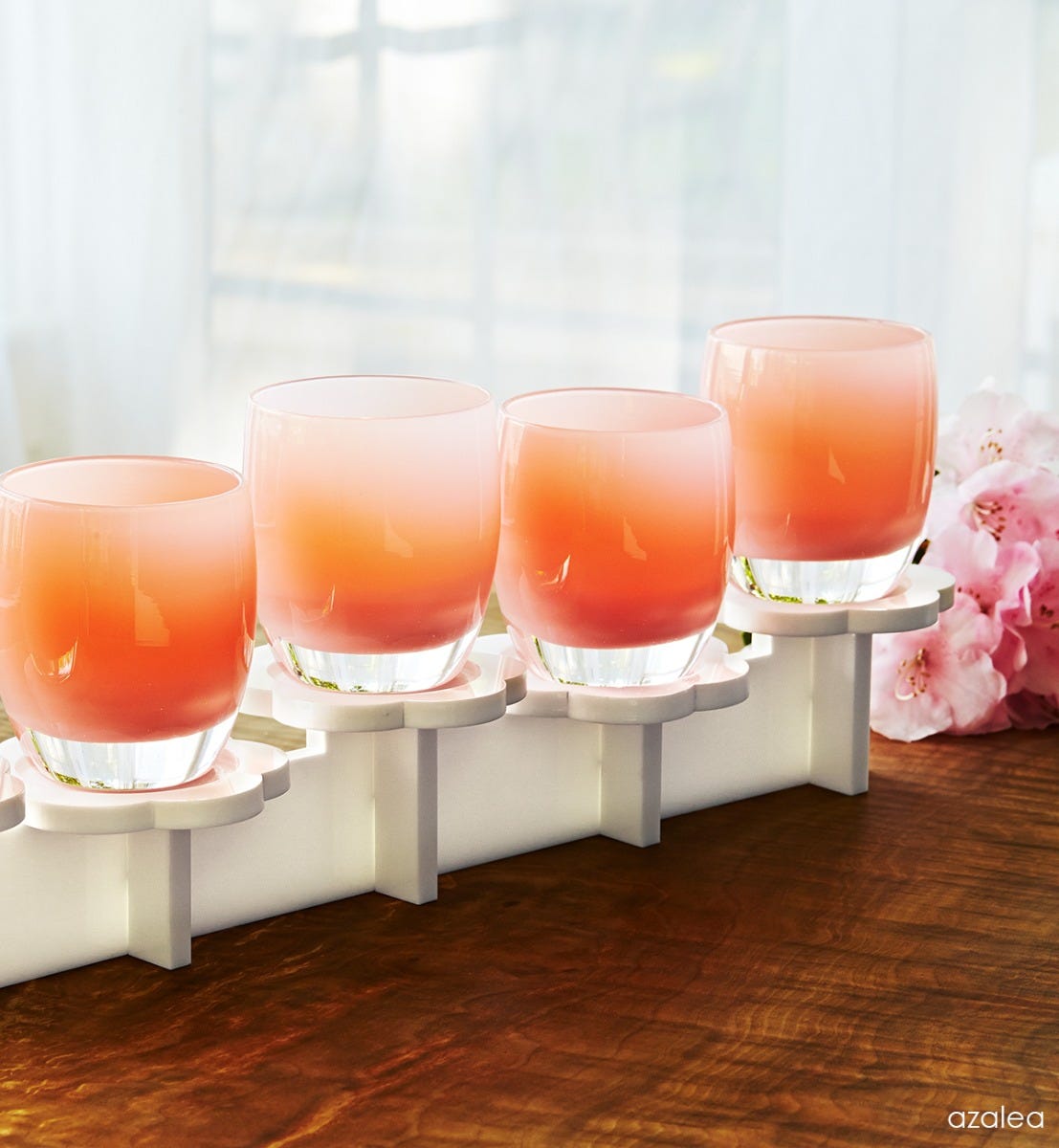 hand-blown peachy pink glass votives