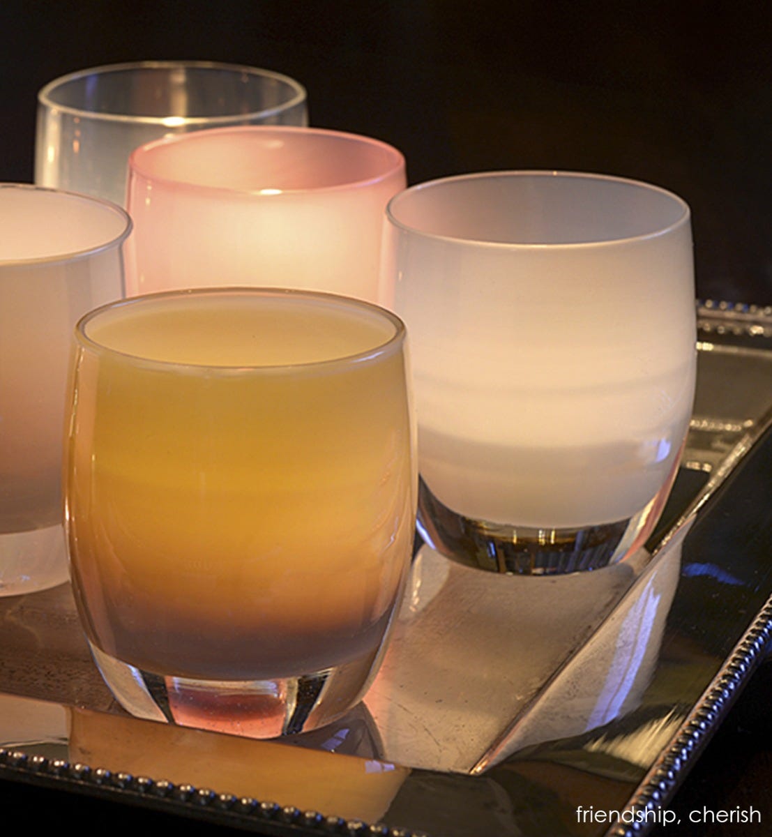 cherish daisy white hand-blown glass votive candle holder. Paired with friendship.
