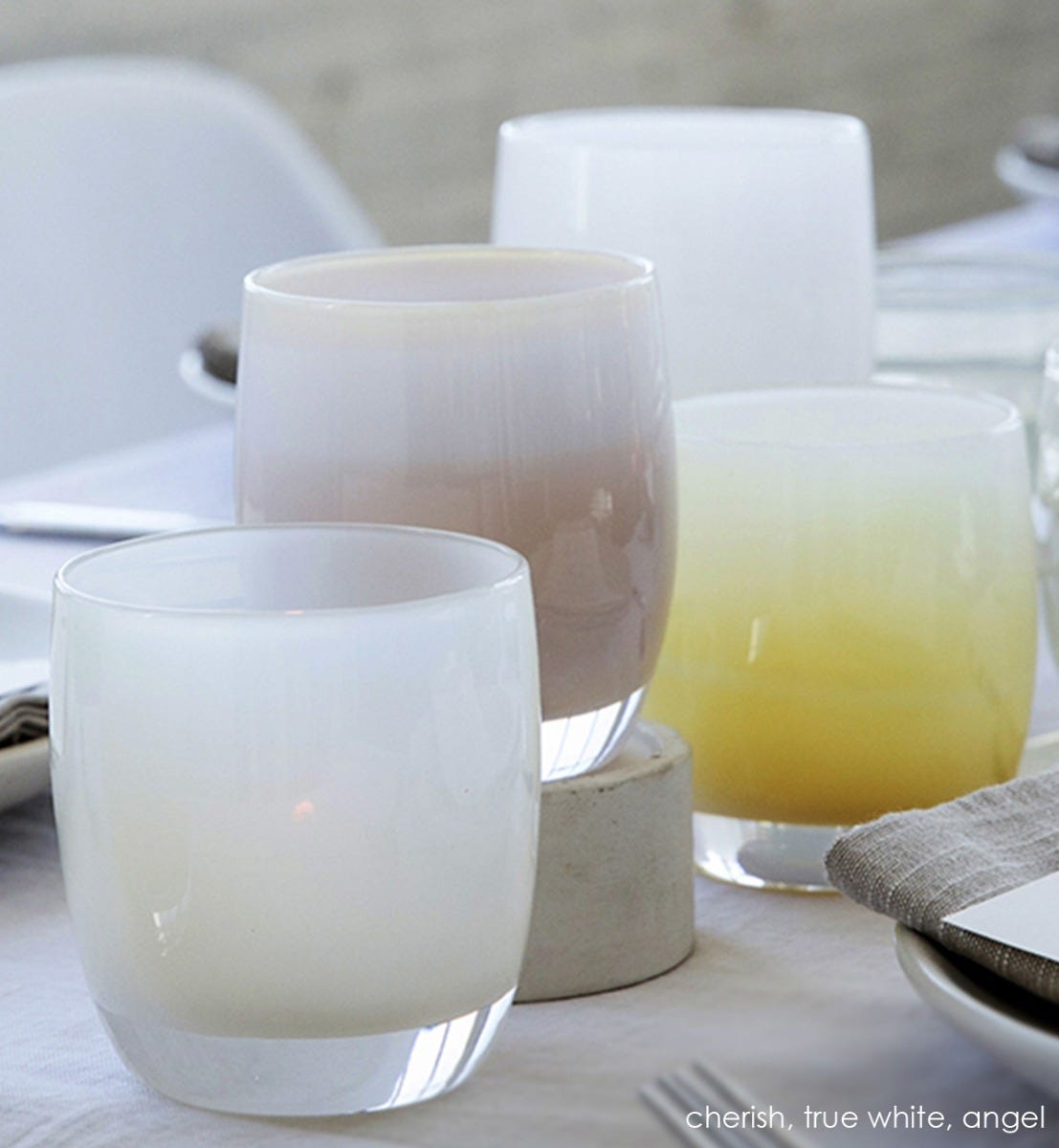 cherish daisy white hand-blown glass votive candle holder. Paired with true white and angel.