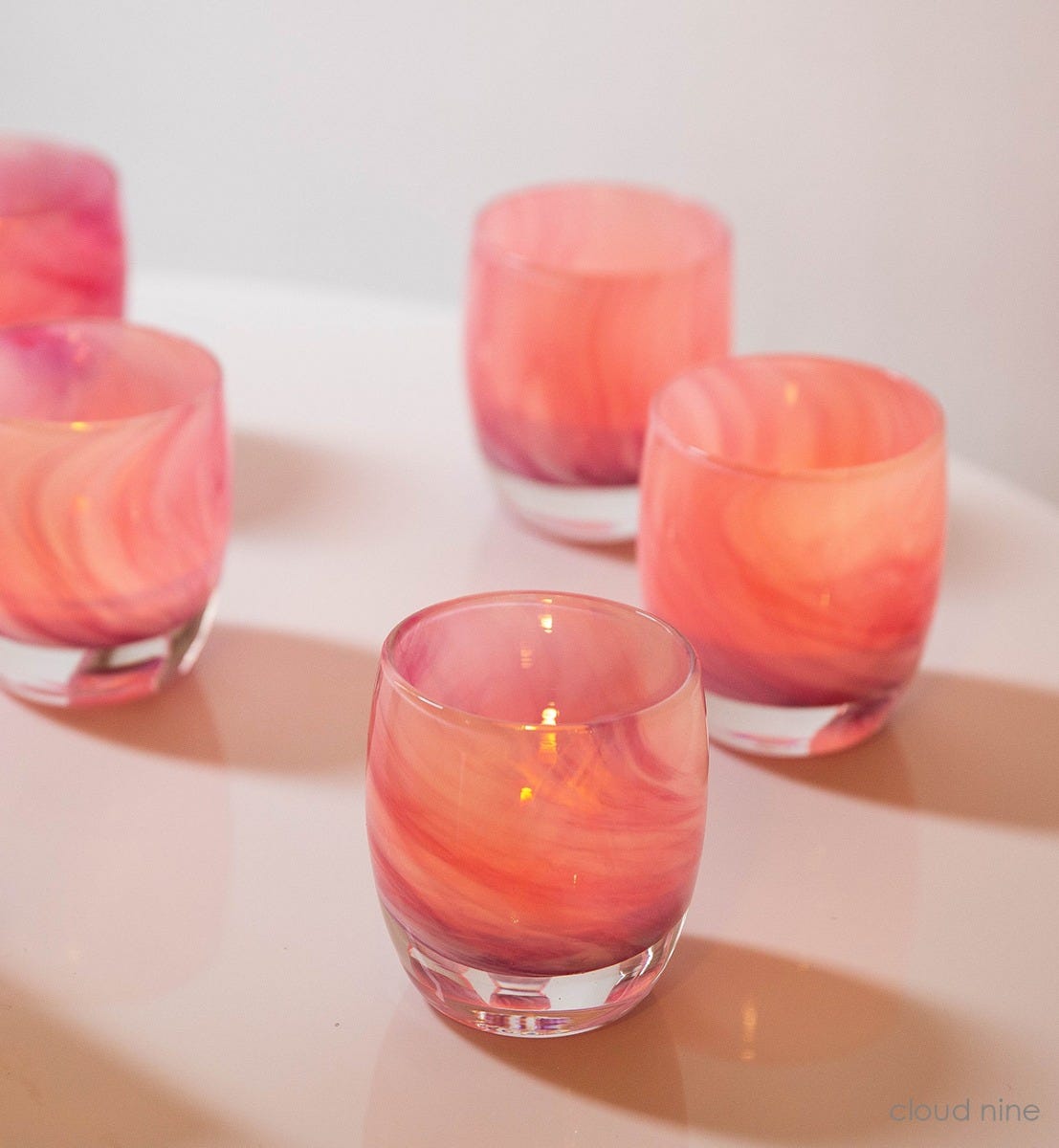 cloud nine hand-blown pink and white swirl glass candle holder