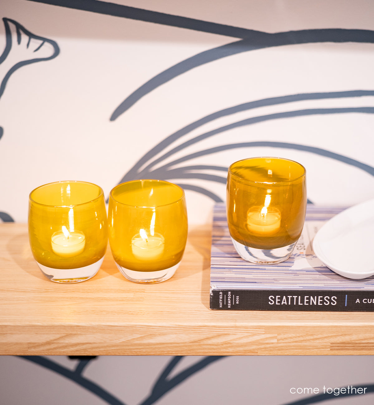 come together tea-stained amber colored, hand-blown glass votive candle holder