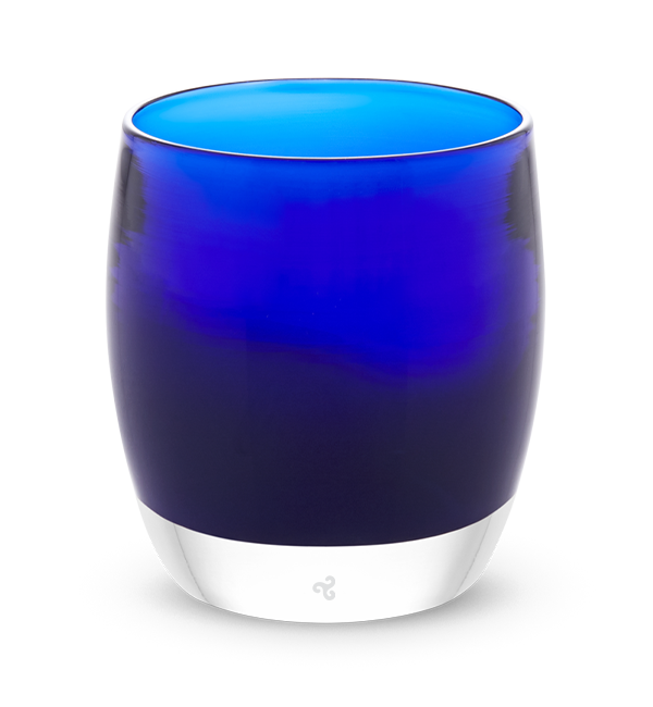 hand-blown admiral blue glass votive candle holder.