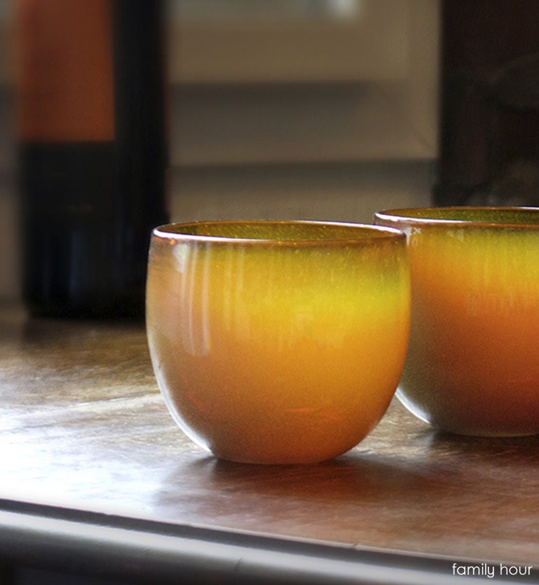 family hour drinker, rust orange hand-blown drinking glass.