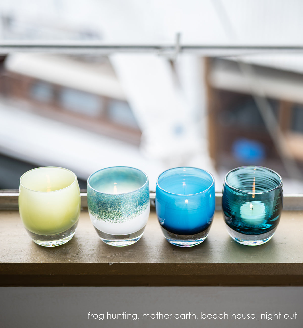 frog hunting moss green, hand-blown glass votive candle holder. Paired with mother earth, beach house, and night out on a windowsill.