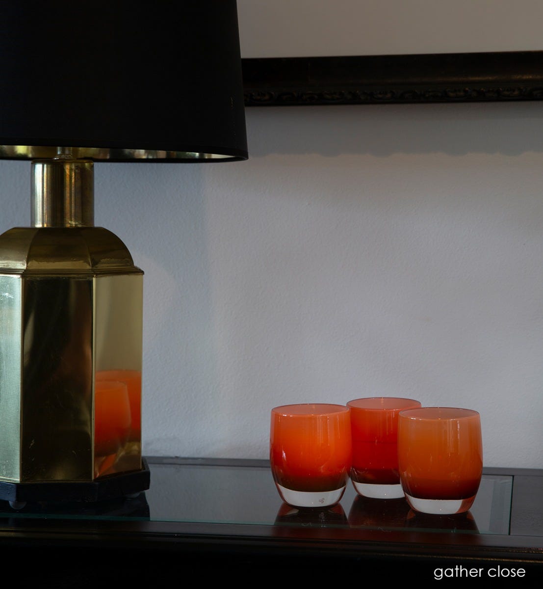 gather close, opaque amber, hand-blown glass votive candle holder.