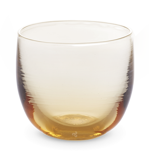 single malt drinker, transparent light amber hand-blown drinking glass.