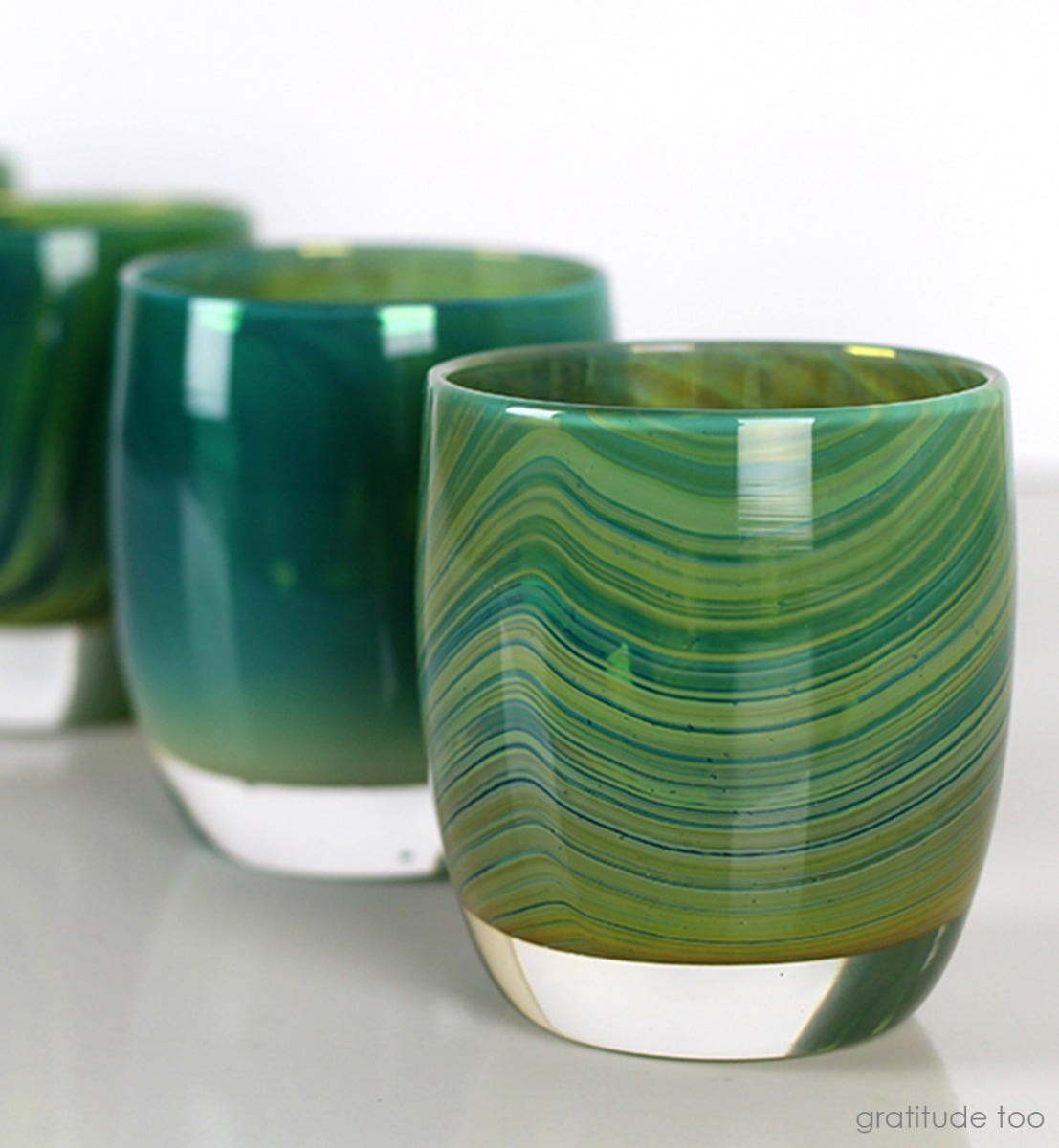 gratitude too, textured translucent teal green with silver luster, hand-blown glass votive candle holder