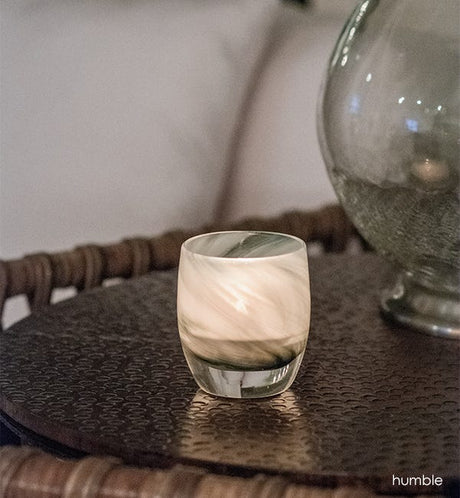 humble hand-blown grey black swirled glass candle holder.