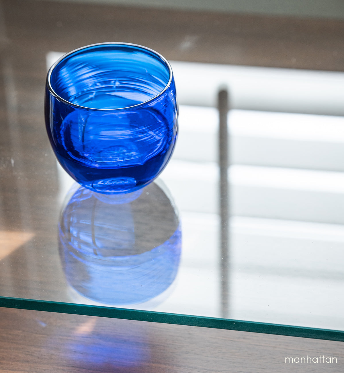 cobalt blue transparent hand-blown glass drinkware.