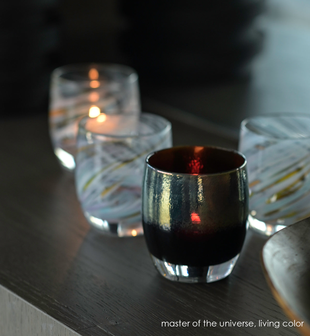 master of the universe silver on brown hand-blown glass votive candle holder. Paired with living color.