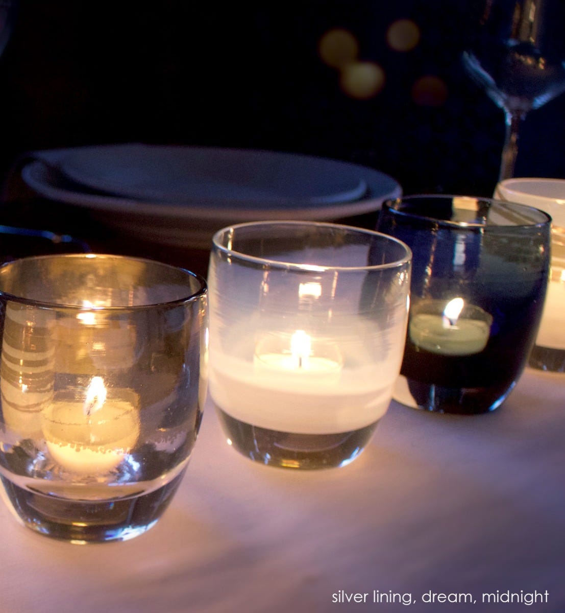 midnight dark blue hand-blown glass votive candle holder. Paired with silver lining and dream.