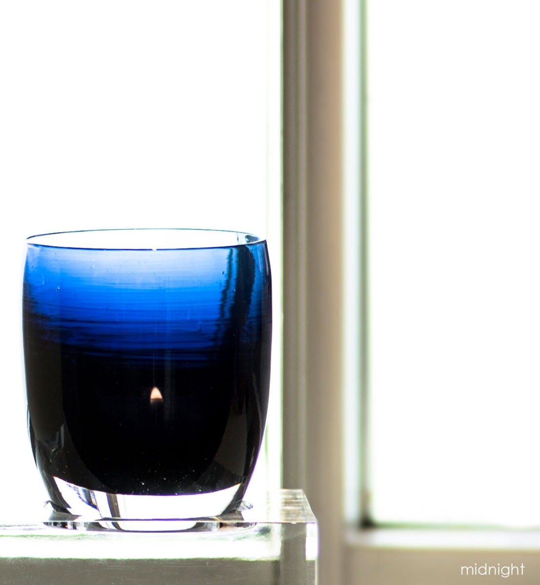midnight dark blue hand-blown glass votive candle holder.